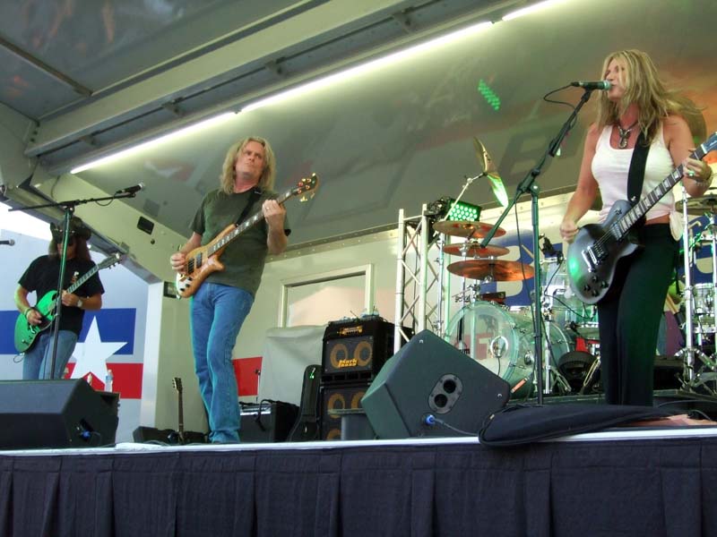 Photo of band members performing